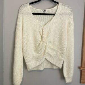 White sweater by Steve Madden